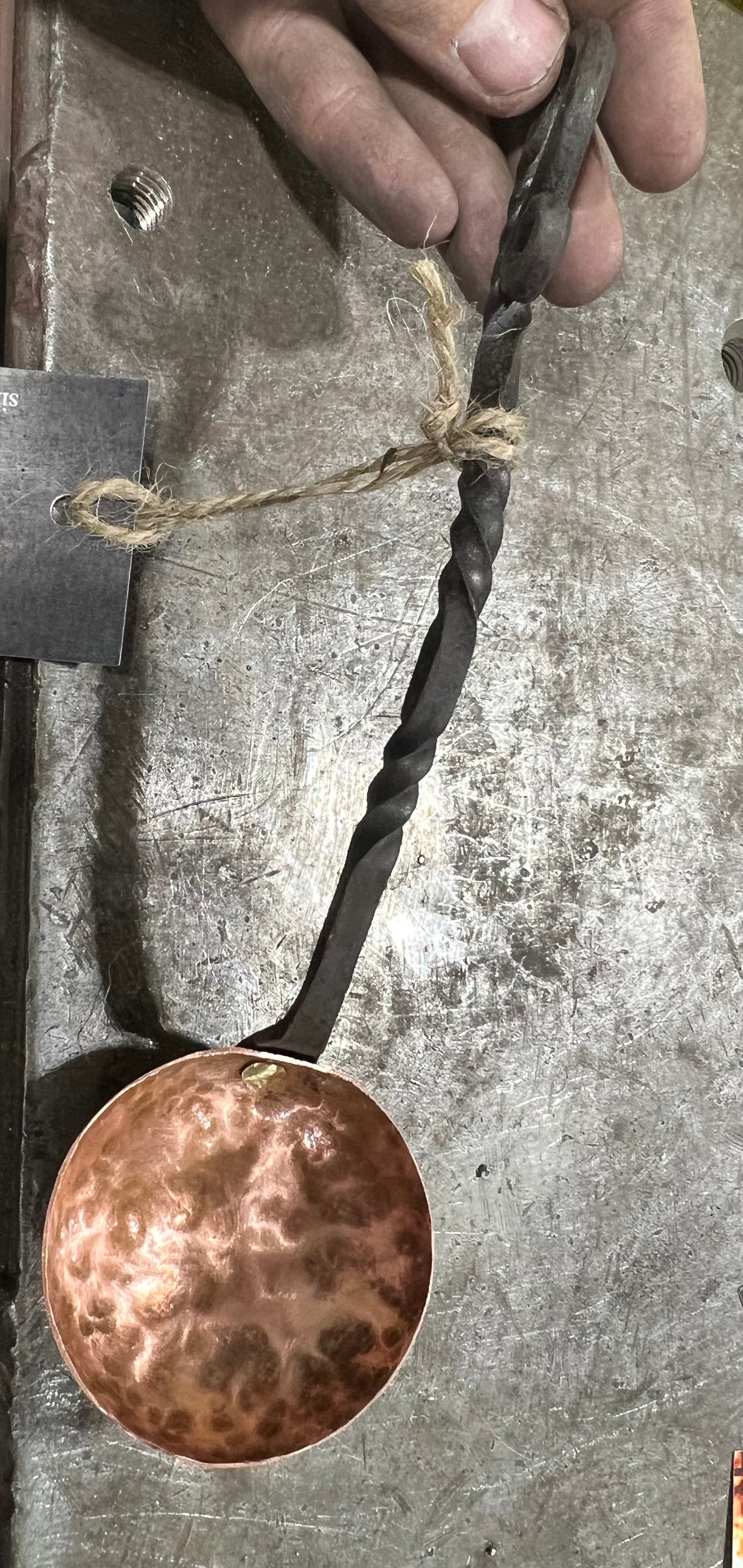 Homemade copper spoon with brass rivet and mild steel handle